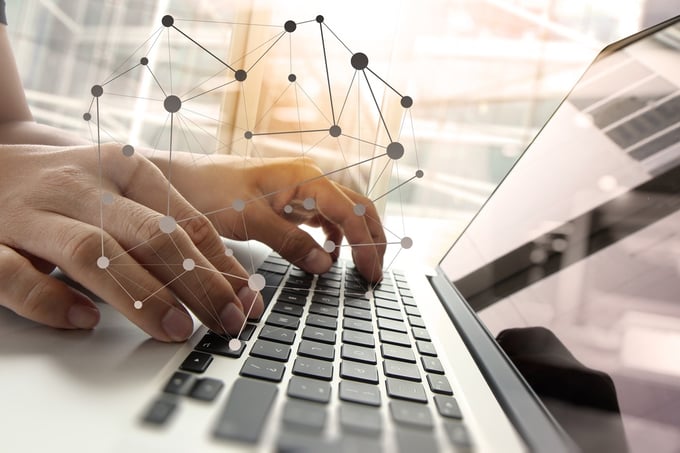 Double exposure of business man hand working on blank screen laptop computer on wooden desk as concept with social media diagram  .jpeg