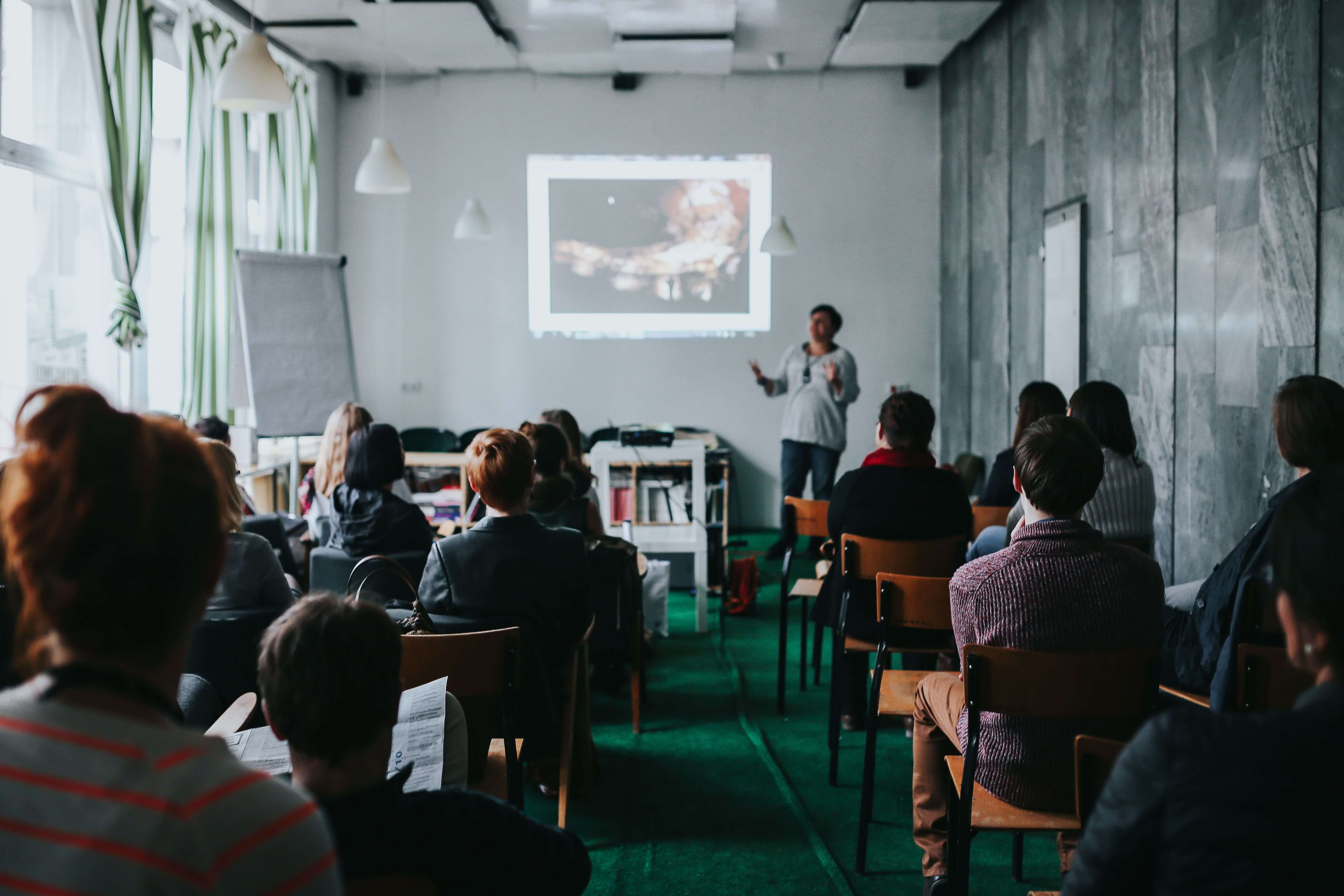 People watching a presentation in a room