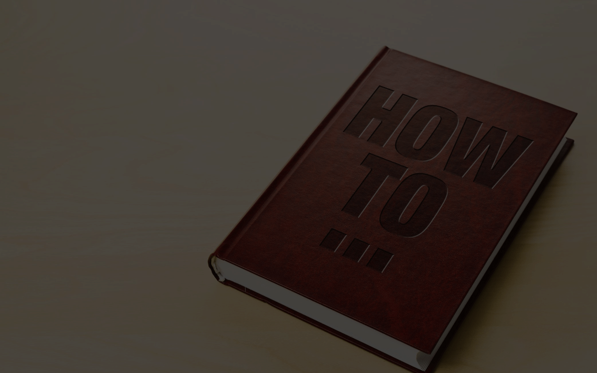 Brown book with the title How To