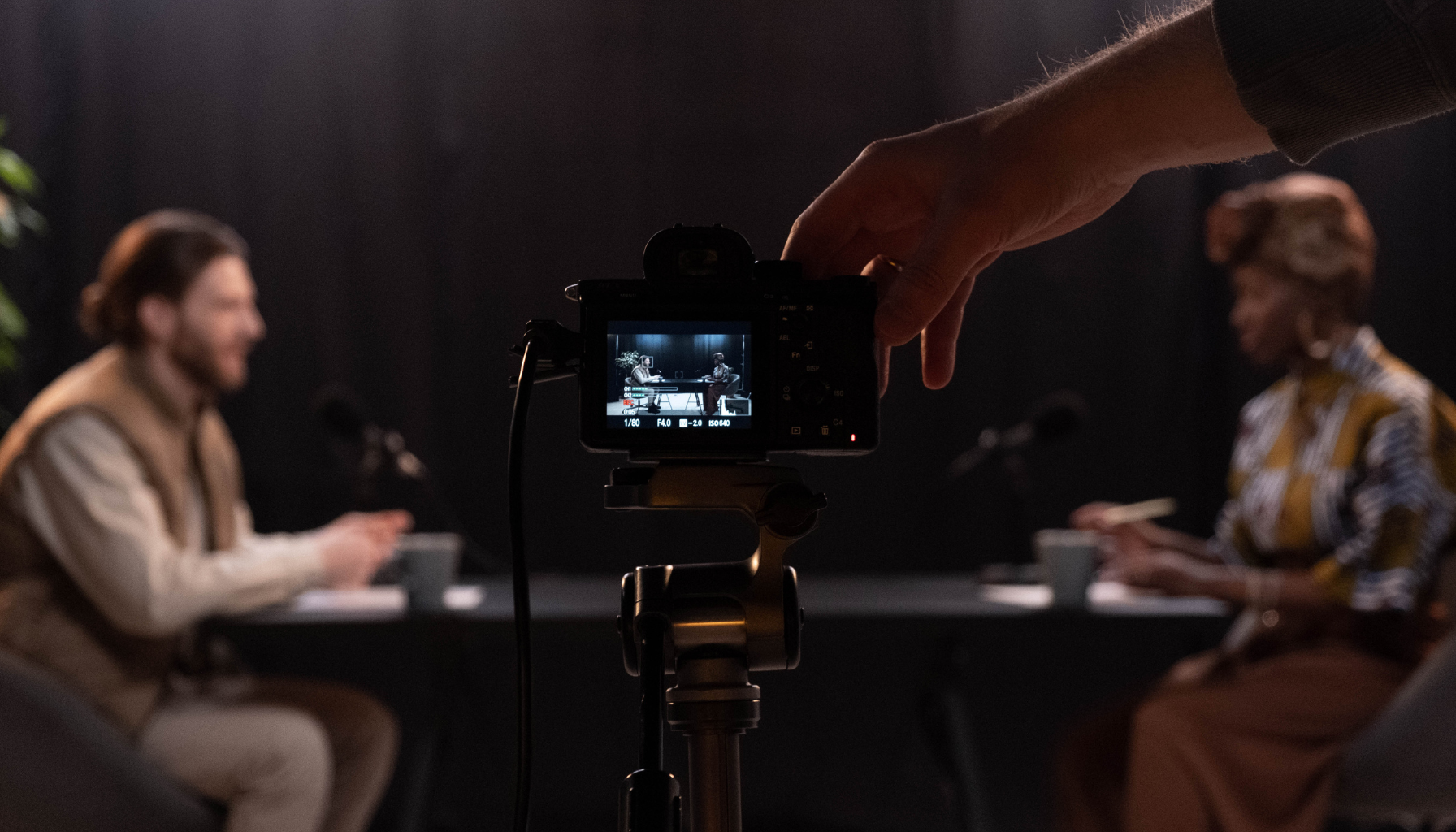 two people being recorded having a conversation
