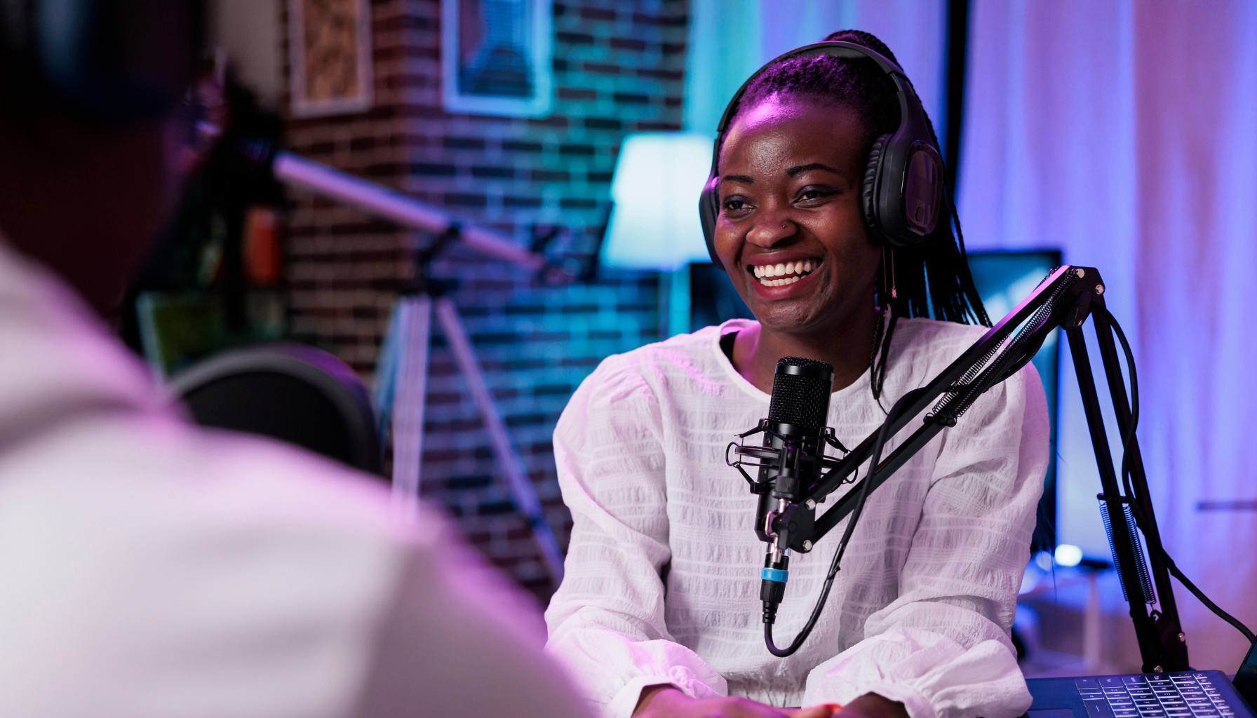 woman speaking into microphone