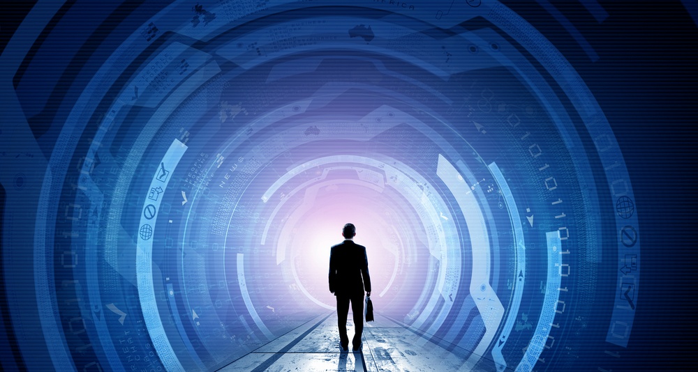 Silhouette of person looking into technology tunnel