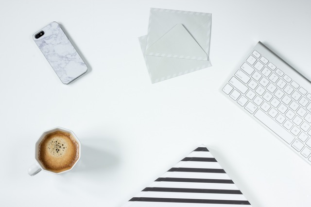 desk-with-coffee-phone-and-keyboard
