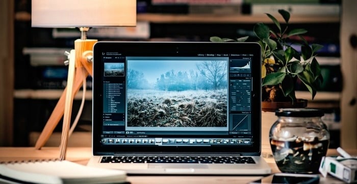 Laptop with picture of mountain landscape of screen